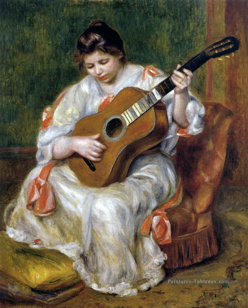 femme jouant de la guitare Pierre Auguste Renoir Peintures à l'huile